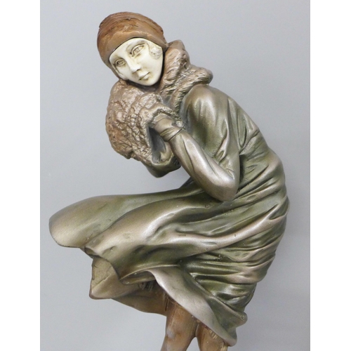 823 - An Art Deco style figure 'Windswept' lady in the wind, after Chiparus, 31cm