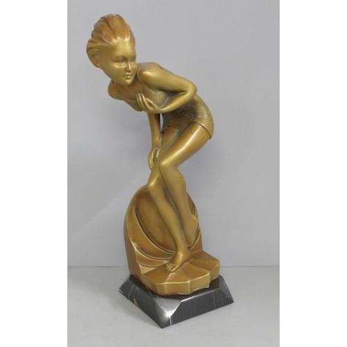 824 - An Art Deco style figure, The Bather, after Ferdinand Preiss, 27cm