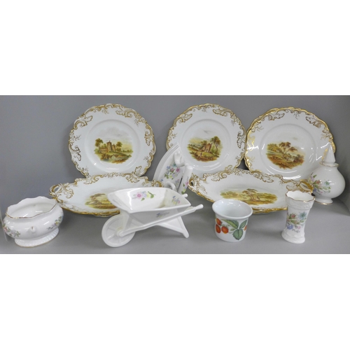 825 - A four setting dessert service and two bread and butter serving plates, each decorated with landscap... 