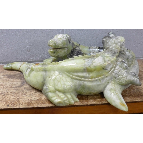 827 - A large carved Chinese jade model of two entwined crocodiles, tail and back claw a/f, 66cm, 35kg **P... 