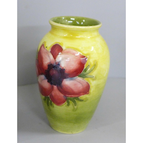 832 - Five items of early 20th Century Moorcroft china, two vases, two bowls and a dish; Hibiscus, Orchid ... 