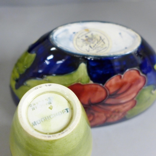 832 - Five items of early 20th Century Moorcroft china, two vases, two bowls and a dish; Hibiscus, Orchid ... 