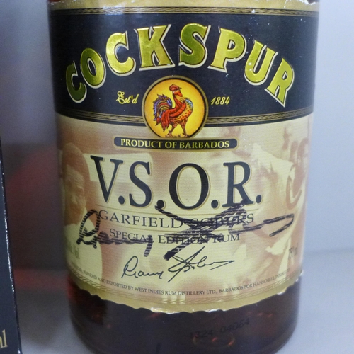 838 - A bottle of Cockspur V.S.O.R. Special Edition Garfield Sobers Rum hand signed on the label by Garfie... 