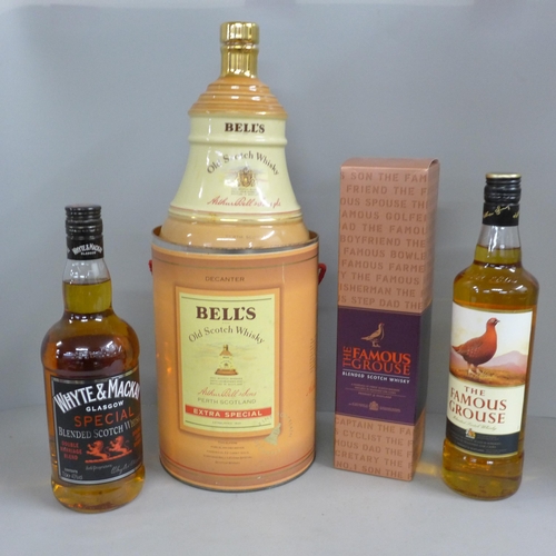 839 - A bottle of Whyte & Mackay Special Blended Scotch Whisky, The Famous Grouse and Bell's Old Scotch Wh... 