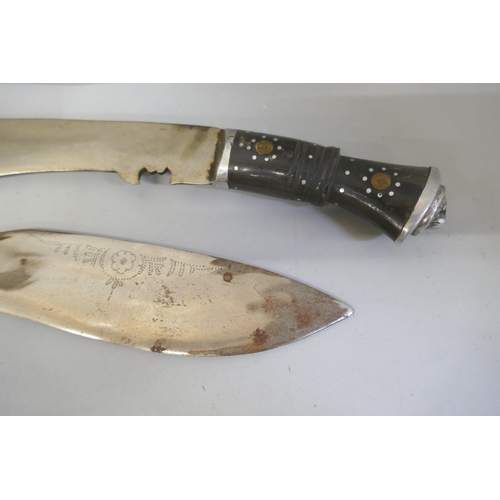 848 - Two Indian kukri and a short sword