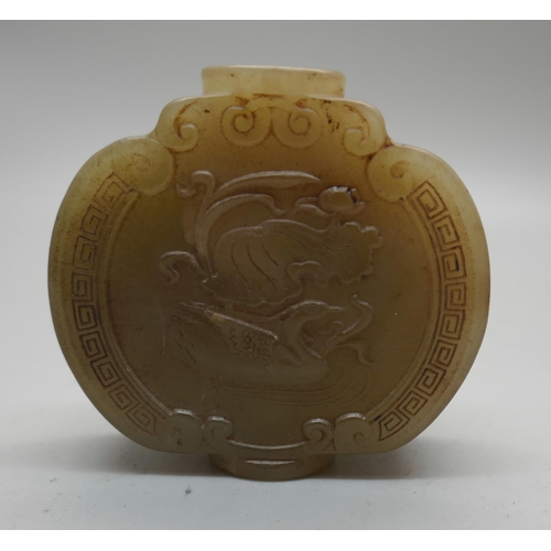 871 - A carved jade scent bottle, lacking stopper