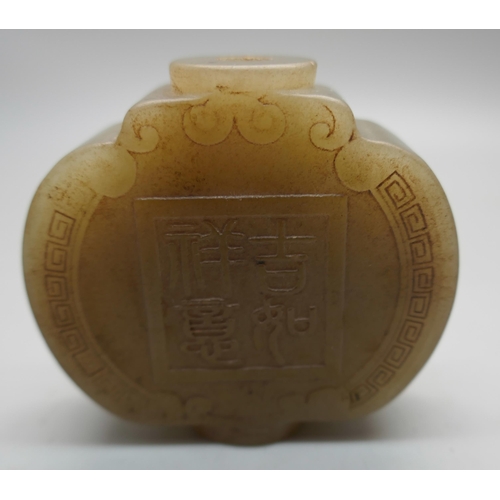 871 - A carved jade scent bottle, lacking stopper