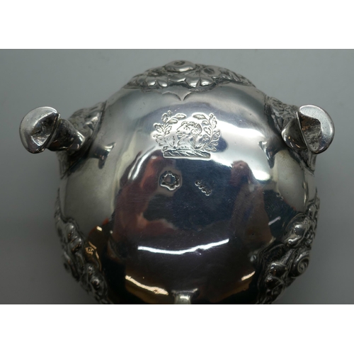 874 - A pair of Georgian silver salt cellars, worn London mark, underside bears crest, 344g