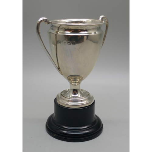 877 - A silver trophy on stand, Elkington, Birmingham 1930, 38g, with inscription