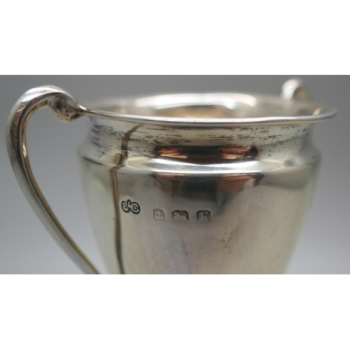 877 - A silver trophy on stand, Elkington, Birmingham 1930, 38g, with inscription