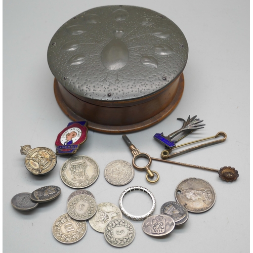 880 - A circular treen box with pewter top and Arts & Crafts peacock detail, a hallmarked silver Royal Arm... 