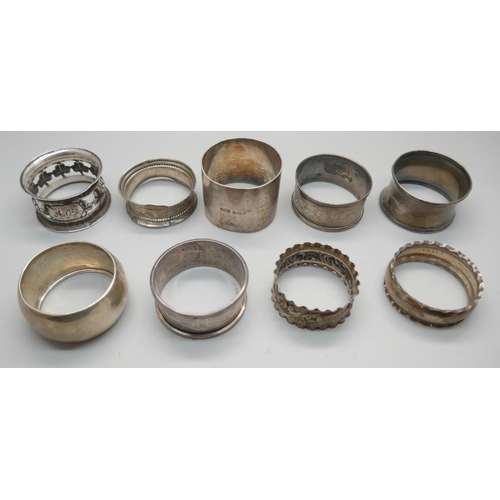 889 - Nine silver napkin rings, 116g