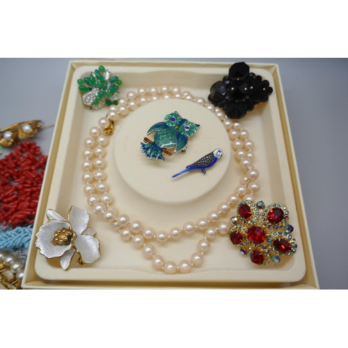 890 - Jewellery; a silver necklace with ten six petal panels, a twig coral necklace, a pair of malachite c... 