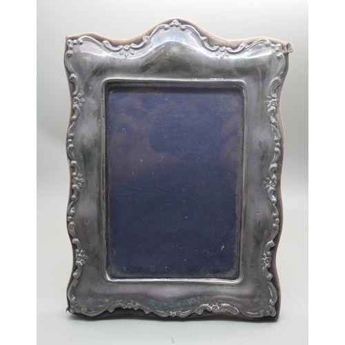 894 - A hallmarked silver photograph frame, London 1991, height 21cm