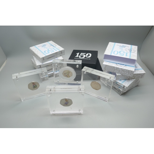 895 - Eleven cased Royal Mint Beatrix Potter 150 years 50p coins; presented in Perspex blocks .