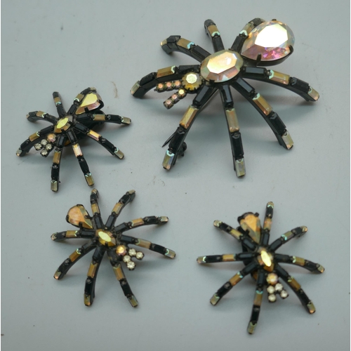 911 - A large Butler & Wilson jewel detail spider, six detailed spiders of various sizes all Butler & Wils... 