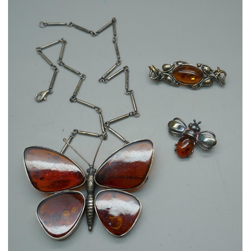 912 - A large silver and amber butterfly brooch, marked DPA and with Birmingham import mark, with attached... 