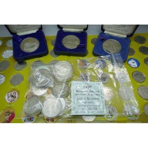 930 - A silver proof Samoa $2 1997, with certificate, nine others, three nickel silver crowns, cased, a £5... 