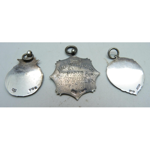 940 - Three silver fob medals including two darts, 18g