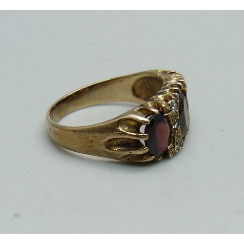 952 - A silver gilt and garnet ring, Q