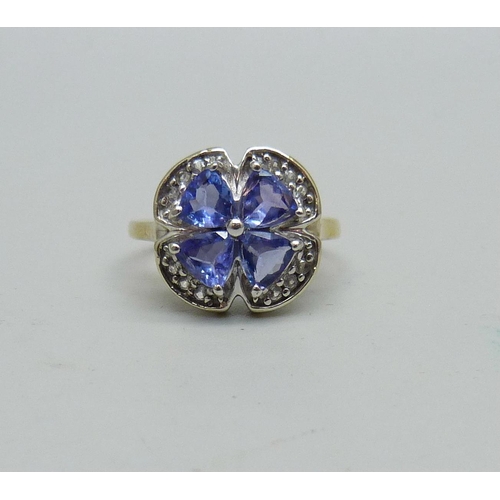 953 - A silver gilt, tanzanite and topaz cluster ring, K