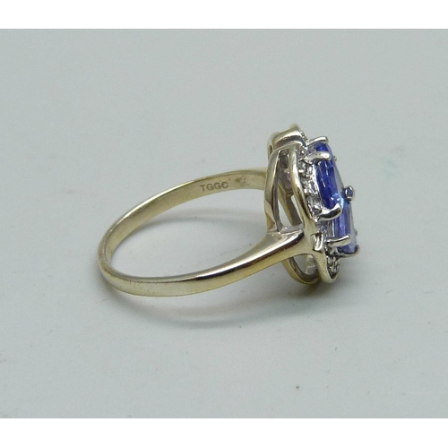 953 - A silver gilt, tanzanite and topaz cluster ring, K