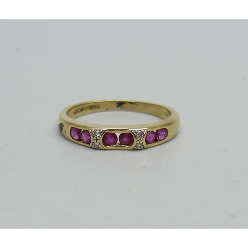 956 - An 18ct gold, ruby and diamond ring, 2.8g, O