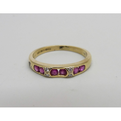 956 - An 18ct gold, ruby and diamond ring, 2.8g, O