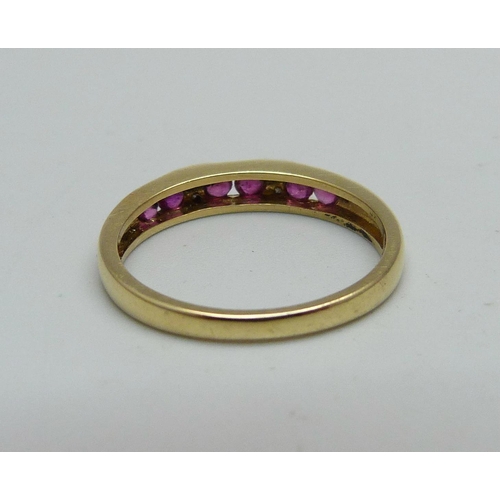 956 - An 18ct gold, ruby and diamond ring, 2.8g, O