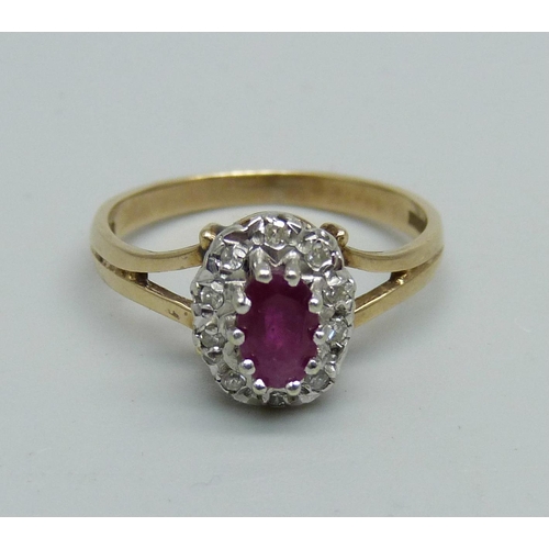 957 - A 9ct gold, ruby and diamond cluster ring, 2.5g, M