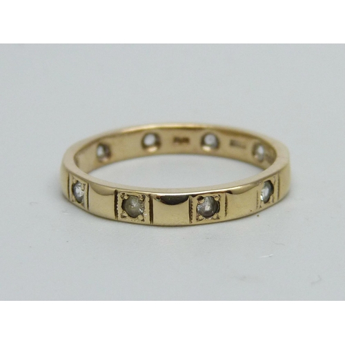 958 - A 9ct gold eternity ring, 2.4g, O