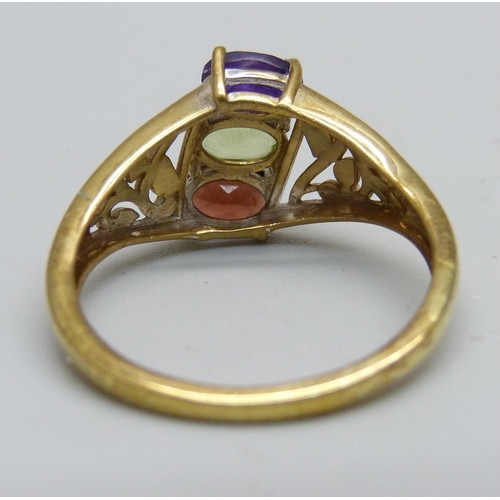 959 - A silver gilt, amethyst, garnet and peridot ring, S