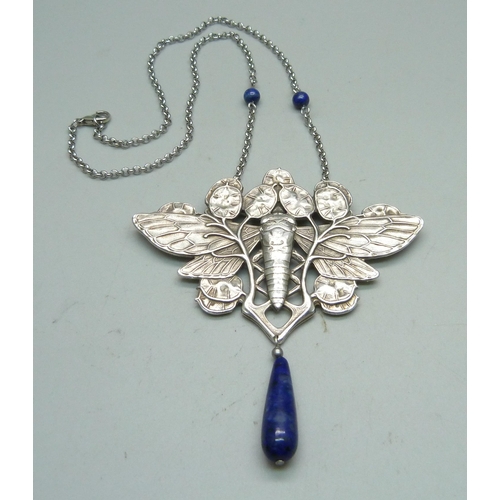 965 - An Art Nouveau style necklace with lapis lazuli, lapis drop chipped