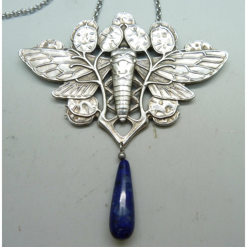 965 - An Art Nouveau style necklace with lapis lazuli, lapis drop chipped