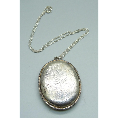 967 - A large 925 silver locket and chain