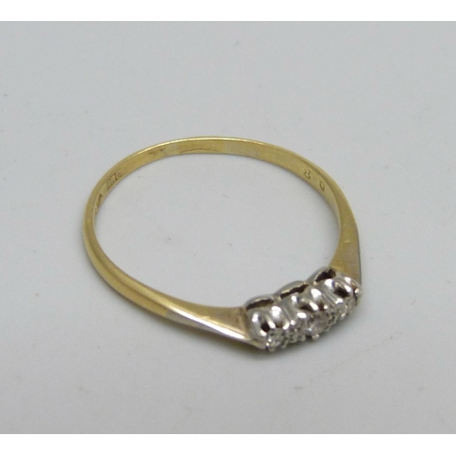 969 - An 18ct gold and three-stone diamond ring, 2g, T