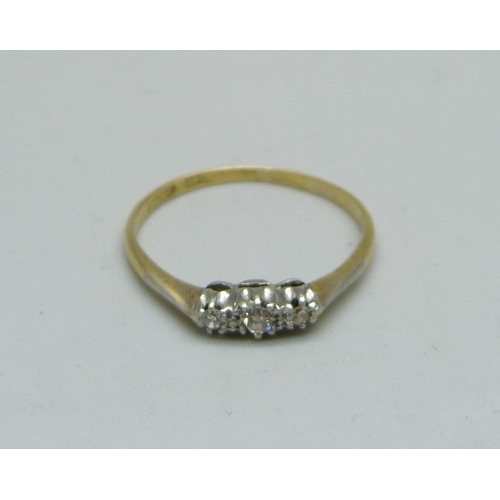 969 - An 18ct gold and three-stone diamond ring, 2g, T