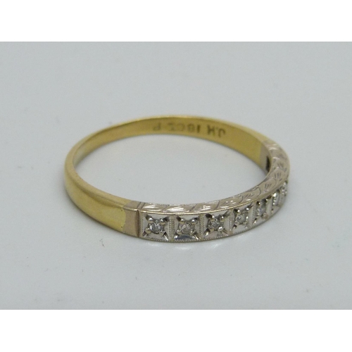 971 - An 18ct gold and nine stone diamond ring, 3.4g, U