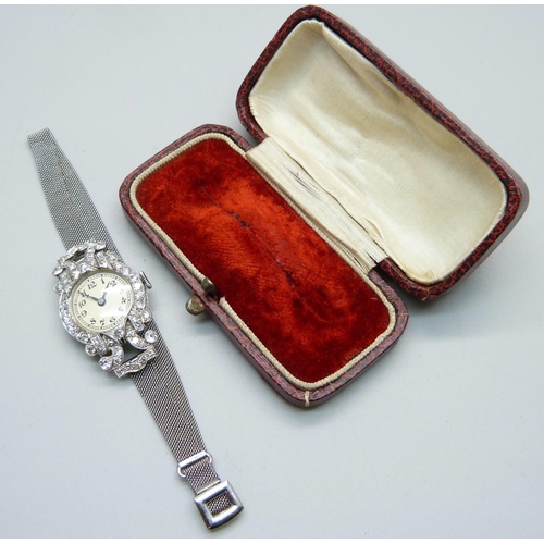 980 - A lady's Art Deco platinum and diamond set cocktail wristwatch, inscription to case back 'D.M.S. 2:1... 