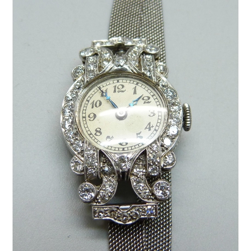 980 - A lady's Art Deco platinum and diamond set cocktail wristwatch, inscription to case back 'D.M.S. 2:1... 