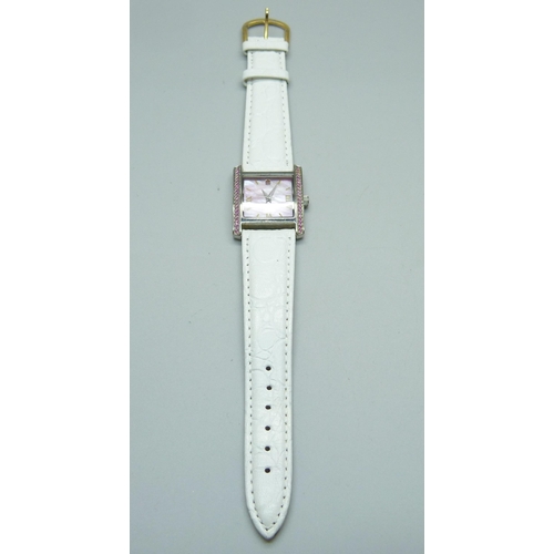 983 - A wristwatch set with pink sapphires