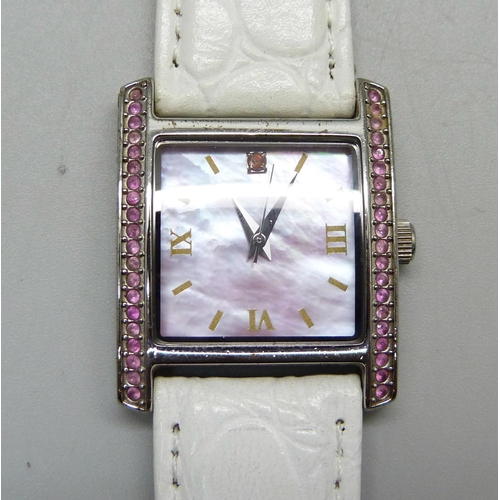 983 - A wristwatch set with pink sapphires