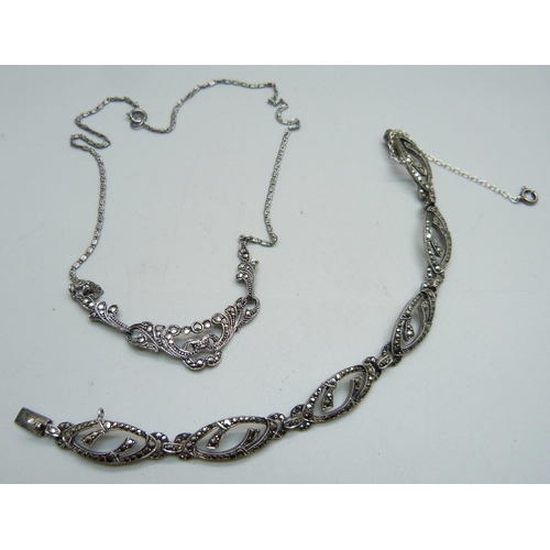 994 - A silver and marcasite necklace and a marcasite set bracelet