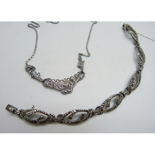 994 - A silver and marcasite necklace and a marcasite set bracelet