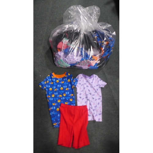 3168 - A large bag of mixed size/style children's clothing * This lot is subject to VAT