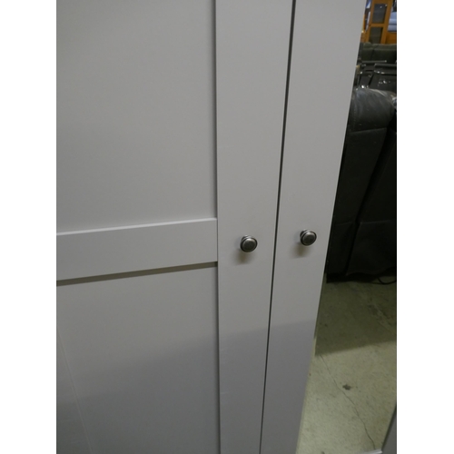 1600 - A grey and mirrored four door wardrobe* This lot is subject to VAT