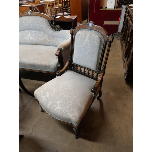 70 - A Victorian ebonised, amboyna and blue fabric upholstered seven piece salon suite, set with Wedgwood... 