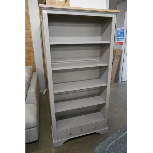 1490 - An oak and grey tall bookcase *This lot is subject to VAT