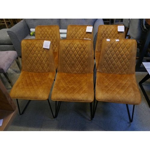 1512 - A set of six turmeric velvet dining chairs *This lot is subject to VAT