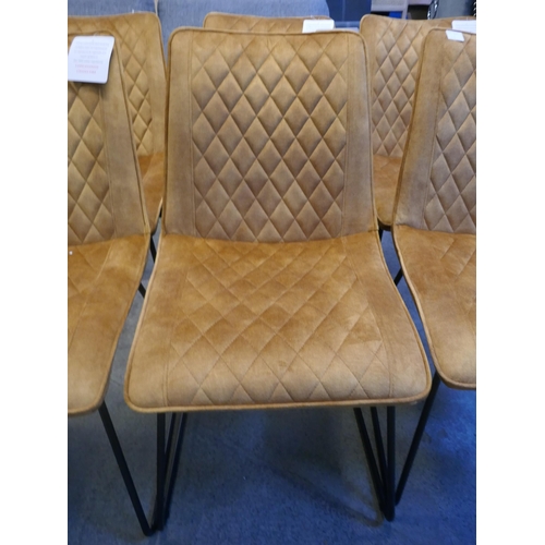 1512 - A set of six turmeric velvet dining chairs *This lot is subject to VAT